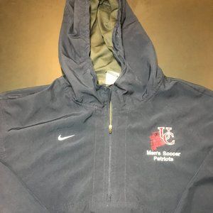 VINTAGE NIKE 90s college wind breaker.